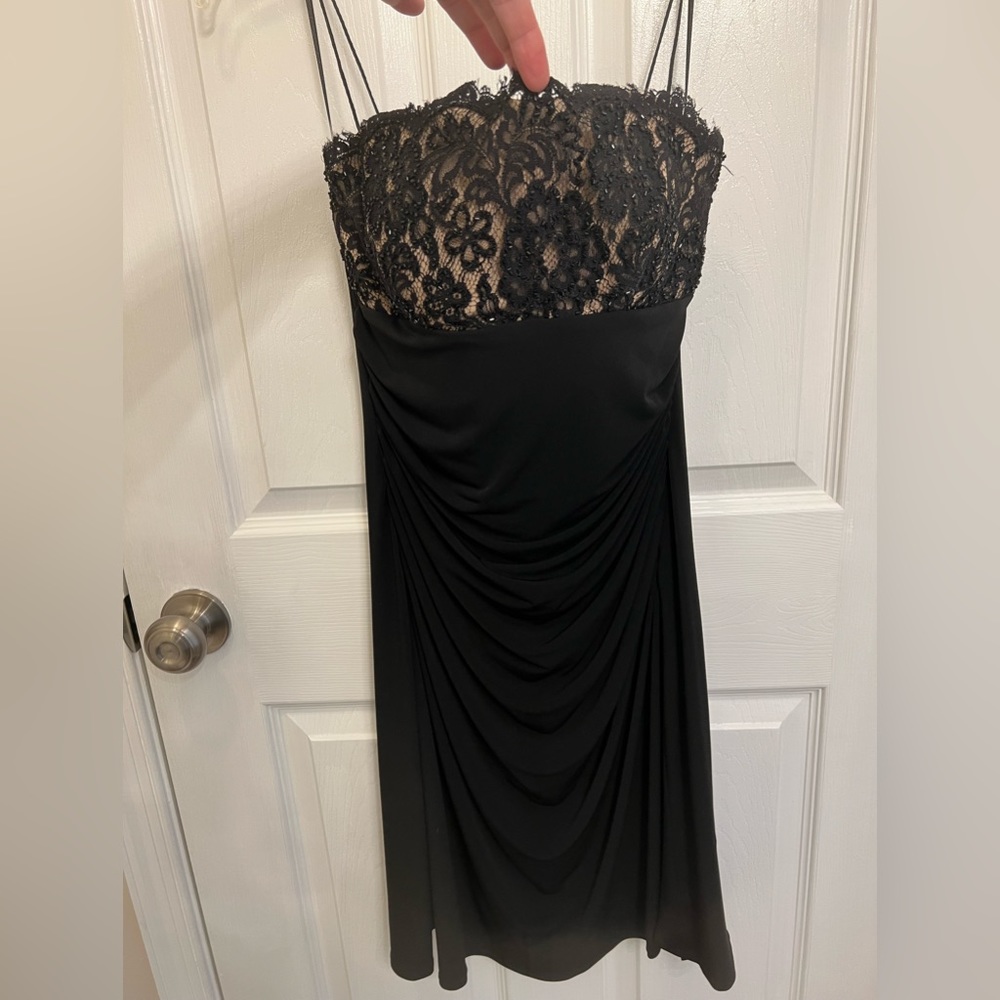 Cocktail size 10 women’s dress! Worn one time.